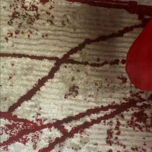 Red and White Abstract Patterned Rug